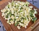 Une image de l'étape 2 de Riz gratiné aux deux fromages, courgette, persil et jambon.