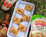 A picture of step 3 of Peri peri pizzeria biscuit sandwich.