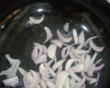 A picture of step 3 of Onion and bitter gourd karela sabji.