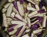 A picture of step 2 of Brinjal French Fries.