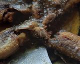 A picture of step 1 of Tangra Machher Jhal/ Small Cat fish Curry.