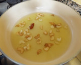 Foto del paso 4 de la receta: Doradas a la espalda con patatas y pimientos en pelotón