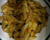 A picture of step 1 of Chips with fried egg.