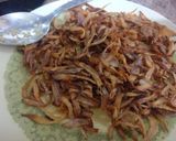 A picture of step 10 of Masala chicken.