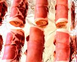 A picture of step 4 of Bacon-wrapped toasted bread rolls.
