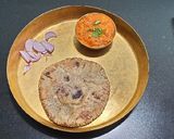 A picture of step 5 of Sev Tomato Bhaji.