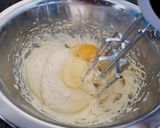 Foto del paso 3 de la receta: Bizcocho marmolado de naranja y chocolate