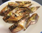 Foto del paso 1 de la receta: Arroz meloso con rape, ajetes y alcachofas