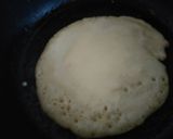 A picture of step 8 of Fluffy blueberry pancakes.