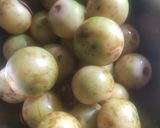 A picture of step 1 of Gujarati style Ripe Gumberry sabzi.