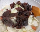 Foto langkah ke 4 dari resep Sapo Tahu Ayam Jamur.