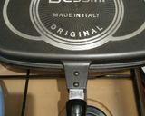 A picture of step 2 of Dessini double grill pan.