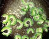 A picture of step 1 of Bitter gourd/karela stir-fry.