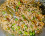 A picture of step 3 of Leftover schezwan onion pulao.