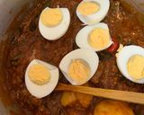 A picture of step 8 of Tin Fish Curry.