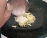 A picture of step 6 of Baingan Posto.