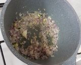 A picture of step 4 of Burnt chilli garlic rice with baked beans gravy.