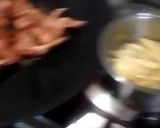 A picture of step 3 of Chickens wings and fried chips.