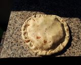 Foto del paso 3 de la receta: Torillazzeta (Tortilla con chicharrón norteña, rellena con cebolla y muzzarela)