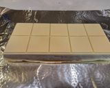 Foto del paso 8 de la receta: Turrón de chocolate blanco relleno de Lotus