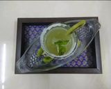 A picture of step 2 of Kiwi mint mojito 🥝🥝.