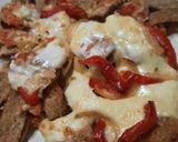Foto del paso 6 de la receta: Milanesa con tomate, tiras de morrón y queso