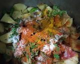 A picture of step 3 of Alu Anday gravy.