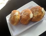 A picture of step 11 of Vanilla cream filled doughnuts.