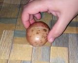 A picture of step 2 of Spicy cheesy baked potatoes.