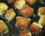 A picture of step 4 of (Snack) Fried Sandwich-Wrapped Sausages.