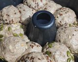 A picture of step 9 of Ragi Savoury Monkey bread.