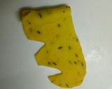 A picture of step 12 of Khasta flower mathri.