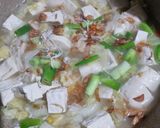 Foto langkah ke 5 dari resep Sup Tahu Rebus Jamur Enoki.