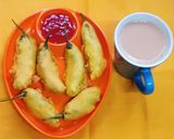 A picture of step 6 of Potato Stuffed Chilli Pakoda.