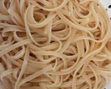 A picture of step 2 of Spaghettis and veg rolls.