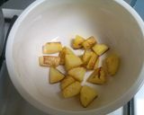 A picture of step 3 of Thor Muri Ghonto (Banana Stem cooked with Rice).