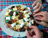 Foto del paso 9 de la receta: Torta Brownie de golosinas "Día del niño"