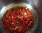 A picture of step 2 of Tomato rasam vada.