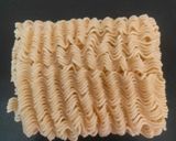 A picture of step 4 of Tangy tomato noodles.