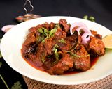 A picture of step 6 of Bhuna Gosht.