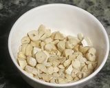 A picture of step 2 of Mawa apple stuff with dryfruits (sweet dish).