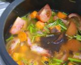 A picture of step 4 of Tomato celantro soup.