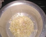 A picture of step 3 of Pumpkin soup with chia seeds toppings, garnished with coriander.