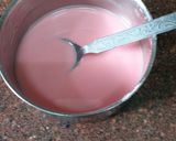 A picture of step 1 of Fruit balls in strawberry custard.