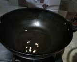 A picture of step 2 of Vegetables Rice.