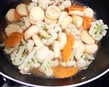 Foto langkah ke 7 dari resep Bunga kol masak sapo tofu.