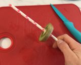 A picture of step 6 of Fruit kabobs.