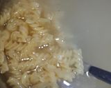 A picture of step 13 of Mac & cheese pasta.