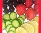 A picture of step 1 of BlackBerry strawberry detox water.