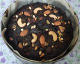 A picture of step 9 of Christmas special eggless plum cake.